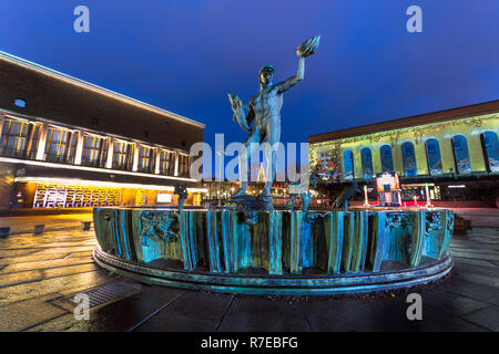 Poseidon statue in the city centre of gothenburg and in the background chritmas decarion at liseburg park Stock Photo