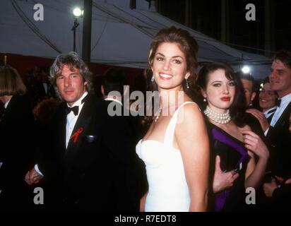 LOS ANGELES, CA - MARCH 29: Actor Richard Gere and model Cindy Crawford attend the 65th Annual Academy Awards on March 29, 1993 at the Dorothy Chandler Pavilion in Los Angeles, California. Photo by Barry King/Alamy Stock Photo Stock Photo