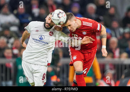 Germany, Berlin. 8th Dec 2018. Niklas SUELE, FCB 4  compete for the ball, tackling, duel, header, action, fight against Mikael ISHAK, FCN 9  FC BAYERN MUNICH - 1.FC NUREMBERG  - DFL REGULATIONS PROHIBIT ANY USE OF PHOTOGRAPHS as IMAGE SEQUENCES and/or QUASI-VIDEO -  1.German Soccer League , Munich, December 08, 2018  Season 2018/2019, matchday 14, FCB, 1.FC Nürnberg © Peter Schatz / Alamy Live News Stock Photo