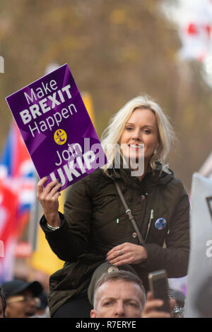Brexit Betrayal march. Protesters are demonstrating at what they see as a betrayal by the UK government in not following through with leaving the EU in its entirety after the referendum. Female with UKIP placard Stock Photo