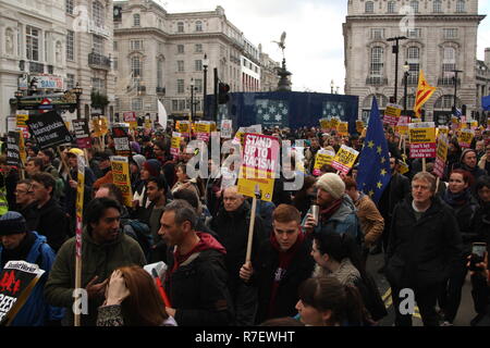 London, UK, 9th December 2018. A demonstration that organisers described as being for all anti-fascists, regardless of their positions on leave/remain on Brexit, opposes 'Tommy Robinson, fascism and racism.   The march from the BBC, Portland Place to Whitehall is a counter protest against one called by Robinson and UKIP. Roland Ravenhill / Alamy Live News