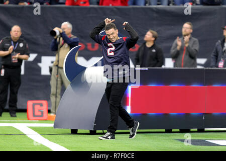 Houston, Texas, USA. 9th Dec, 2018. Houston Astros third baseman Alex Bregman is introduced as the home field advantage captain prior to the NFL regular season game between the Houston Texans and the Indianapolis Colts at NRG Stadium in Houston, TX on December 9, 2018. Credit: Erik Williams/ZUMA Wire/Alamy Live News Stock Photo