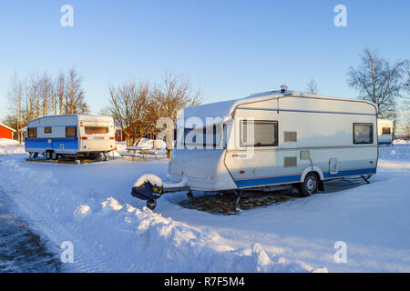 Winter camping caravans at a campsite Stock Photo