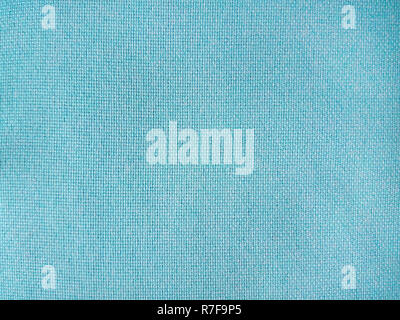 Light blue linen cotton fabric texture, canvas background Stock Photo
