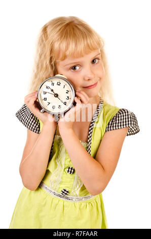little girl with clock isolated on a white background Stock Photo