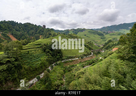 Longji Jinkeng Rice terrace area in Guangxi, China. A traditional Village with a minority population, catering to tourists visiting.September 13, 2017 Stock Photo