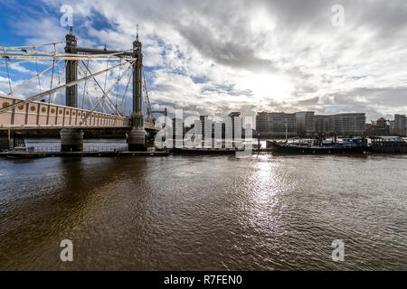 The unusually coloured Albert Bridge, Chelsea. Painted to make it more obvious to shipping. London SW3 5RQ. UK Stock Photo