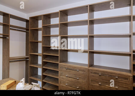 Large with in closet with many shelves and drawers. Stock Photo