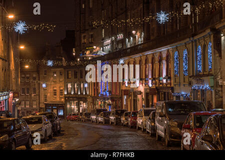 The speciality shops of the West Bow in Edinburgh bring an old world charm to the Christmas season in 2018 Stock Photo