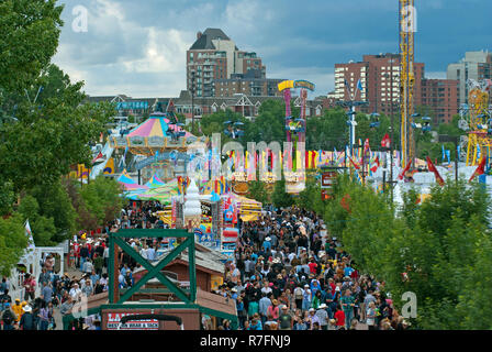 Crowd walking in Stampede Park during Calgary Stampede show, Calgary, Alberta, Canada Stock Photo
