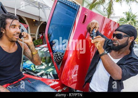 Miami Beach Florida,Ocean Drive,Lummus Park,Urban Beach Week,Memorial Day Weekend,hip hop culture,Black Blacks African Africans ethnic minority,man me Stock Photo