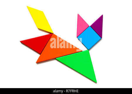 Color wood tangram puzzle in cat shape on white background Stock Photo