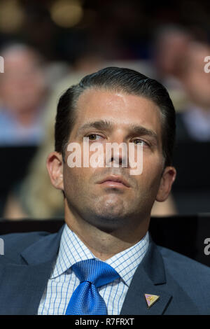Don Trump, Jr., son of GOP Presidential nominee Donald Trump watches from the family box during the first day of the Republican National Convention at the Quicken Loans Center July 18, 2016 in Cleveland, Ohio. Stock Photo