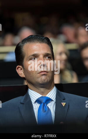 Don Trump, Jr., son of GOP Presidential nominee Donald Trump watches from the family box during the first day of the Republican National Convention at the Quicken Loans Center July 18, 2016 in Cleveland, Ohio. Stock Photo