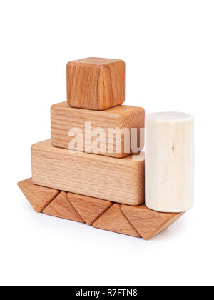 Photo wooden constructor of small cubes, triangles, balls and other forms of beech on a white isolated background. Wooden designer, folded in the shap Stock Photo