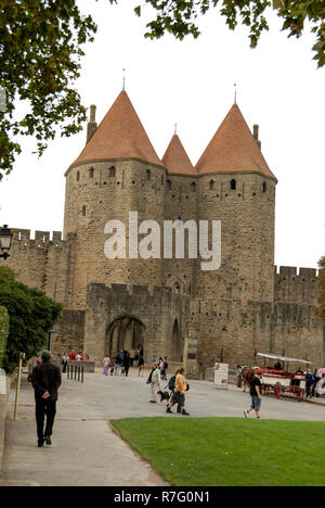 The main gates leading into the Castle at  Carcassonne. It is a French historical hilltop town with its medieval fortified castle complete with narrow Stock Photo