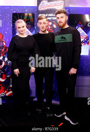 Clean Bandit's Grace Chatto, Luke Patterson and Jack Patterson (left-right) backstage in the on air studio during day two of Capital's Jingle Bell Ball with Coca-Cola at London's O2 Arena. Stock Photo