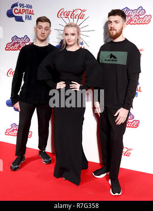 Clean Bandit's Luke Patterson, Grace Chatto and Jack Patterson (left-right) on the media run during day two of Capital's Jingle Bell Ball with Coca-Cola at London's O2 Arena. Stock Photo