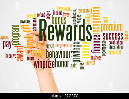 Rewards word cloud and hand with marker concept on white background. Stock Photo