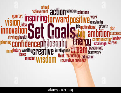 Set Goals word cloud and hand with marker concept on white background. Stock Photo