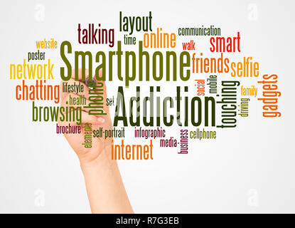 Smartphone addiction word cloud and hand with marker concept on white background. Stock Photo
