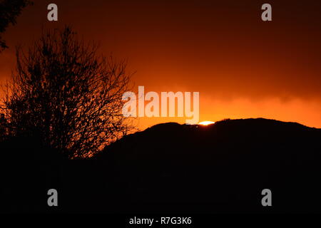 Sun Setting Behind Mountain 'Moel Y Geist' Stock Photo