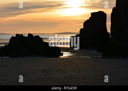 Sunset over Blackrock Sands in Gwynedd, Wales Stock Photo