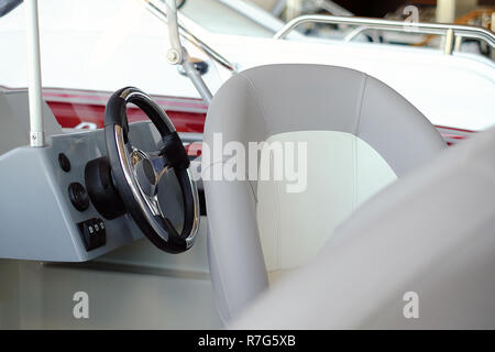 The cabin of the boat with an easy chair. Boat cabin with all navigation equipment Stock Photo