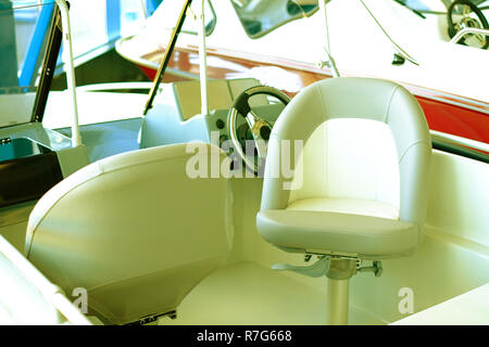 The cabin of the boat with an easy chair. Boat cabin with all navigation equipment Stock Photo