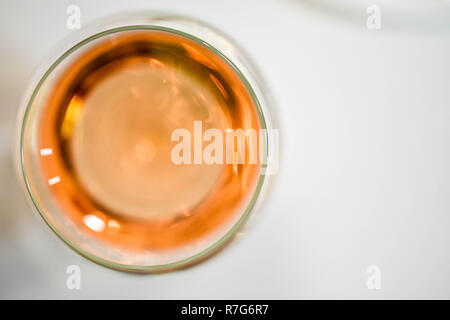 Abstract alcohol art: top view of a wine glass, ready for a degustation Stock Photo