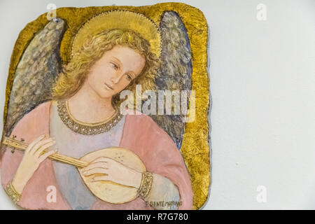 Medjugorje, Bosnia and Herzegovina - November 3, 2018: angel plays the mandolin in old painting Stock Photo