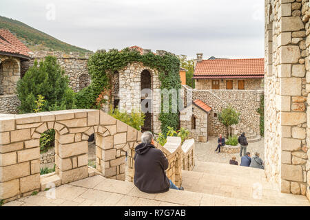 Medjugorje, Bosnia and Herzegovina - November 3, 2018: pilgrims sit and walk the streets of the town Stock Photo