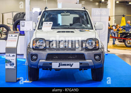Detail of a nice white Suzuki Samurai with big wheels and snorkel modified  for crawling Stock Photo - Alamy