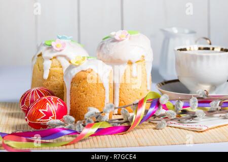 Easter cake and egg Pysanka on a white background Stock Photo