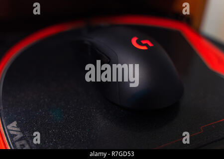 Valencia, Spain- 09 December,2018: Famous gaming mouse Logitech G403 with red logo,  on Nova mouse pad. Stock Photo