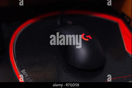 Valencia, Spain- 09 December,2018: Famous gaming mouse Logitech G403 with red logo,  on Nova mouse pad. Stock Photo
