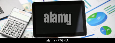 Businessman holds tablet on background Stock Photo