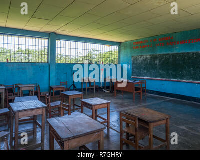 Santa Rita, Peru - Sep 19, 2018: Primary school in the small village in the amazons jungle. Tropical rainforests. Latin America. Stock Photo