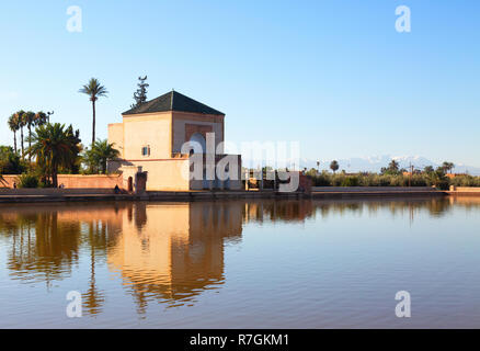 The Menara Gardens Marrakech Morocco, with pavilion and Atlas Mountains in the background, Marrakesh Morocco North Africa Stock Photo