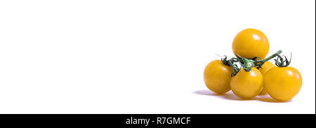 Close-up of yellow cherry tomatoes isolated on white Background. Stock Photo