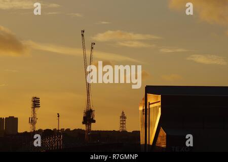 Pittodrie Stadium and Tower Crane at Sunset. Aberdeen, Scotland, UK. Stock Photo