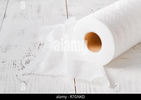 Cleaning window spray with Roll of disposable nonwoven fabric towels Stock Photo