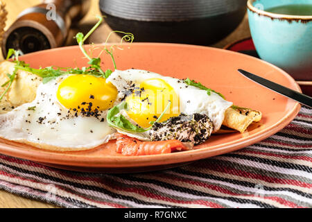 Scrambled eggs with smoked salmon, Breakfast food Stock Photo