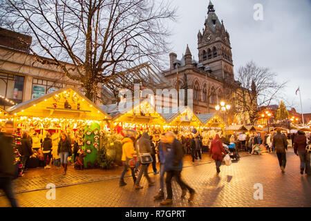 Christmas market at nighttime in front of the town hall in the historic city of Chester county town of Cheshire England UK Stock Photo