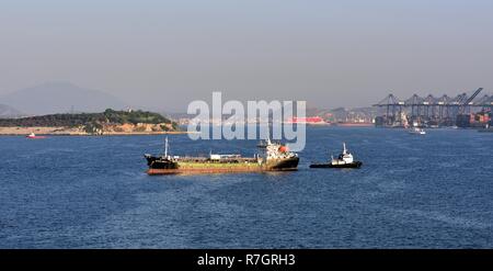 Piraeus, Athens, Greece - 7th july 2018;Aegean Breeze 1 under tug power in the Port of Piraeus Stock Photo