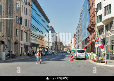 BERLIN, GERMANY - JULY 14, 2018: Unrecognized people walk along Franzosische Strasse street in downtown. Berlin is the capital and German largest city Stock Photo