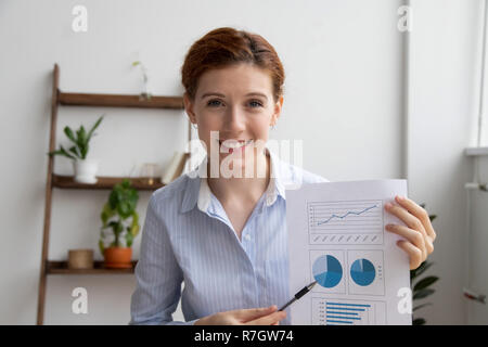 Business woman make financial report by video call using compute Stock Photo