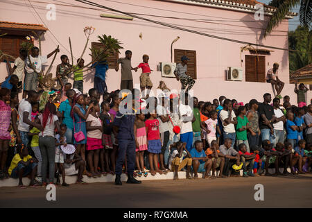 Bissau, Republic of Guinea-Bissau - February 12, 2018: Crowd watching the parades during the Carnival Celebrations in the city of Bisssau. Stock Photo