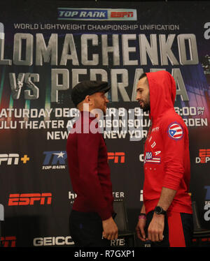 Lightweight world champion boxer Vasiliy Lomachenko (L) and Jose Pedraza faceoff before title unification fight Stock Photo