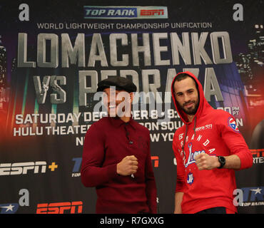 Lightweight world champion boxer Vasiliy Lomachenko (L) and Jose Pedraza posing during press conference before title unification fight Stock Photo